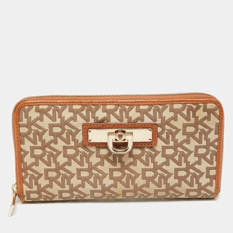 Pre Owned Dkny Tan/Beige Monogram Canvas and Leather Zip Around Continental Wallet