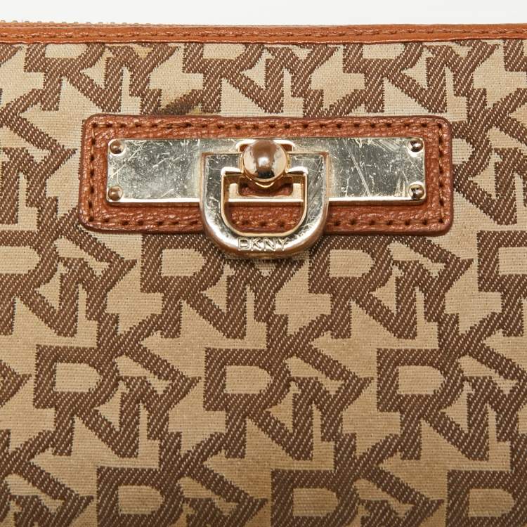 Pre Owned Dkny Tan/Beige Monogram Canvas and Leather Zip Around Continental Wallet