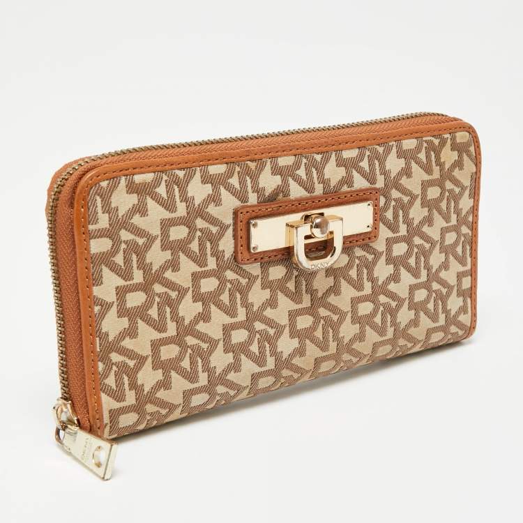 Pre Owned Dkny Tan/Beige Monogram Canvas and Leather Zip Around Continental Wallet
