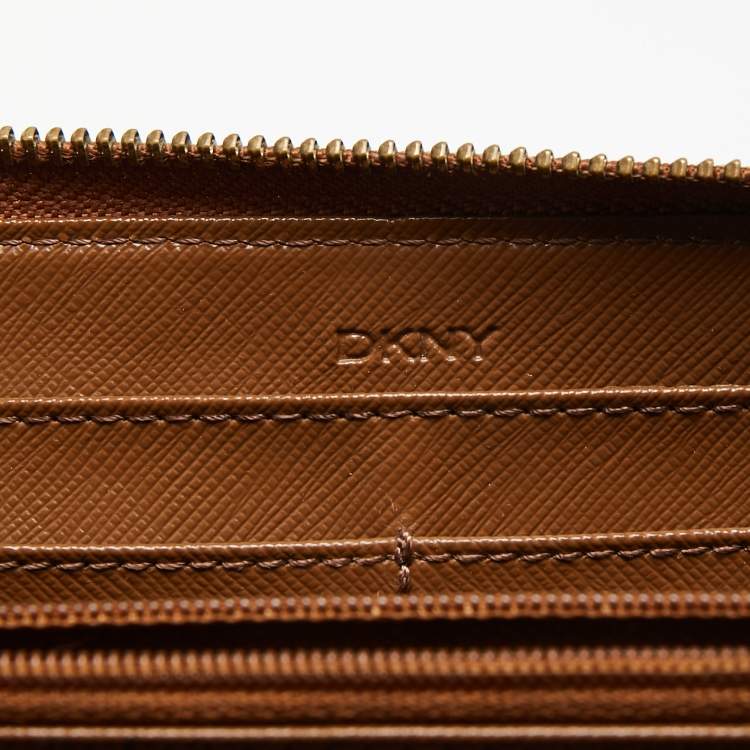 Pre Owned Dkny Tan/Beige Monogram Canvas and Leather Zip Around Continental Wallet