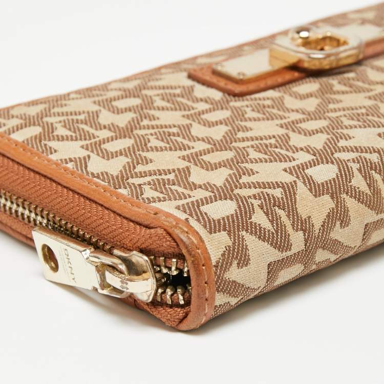 Pre Owned Dkny Tan/Beige Monogram Canvas and Leather Zip Around Continental Wallet