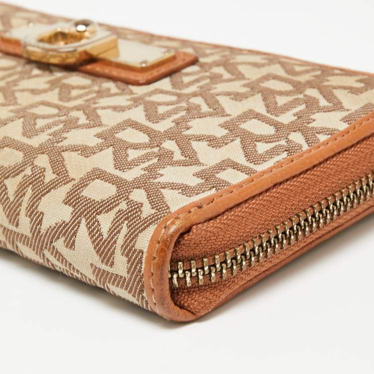 Pre Owned Dkny Tan/Beige Monogram Canvas and Leather Zip Around Continental Wallet