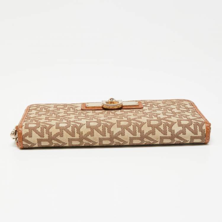 Pre Owned Dkny Tan/Beige Monogram Canvas and Leather Zip Around Continental Wallet