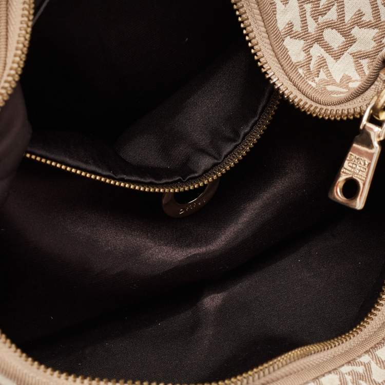 Pre Owned Dkny Beige/Rust Signature Canvas and Leather Baguette Bag
