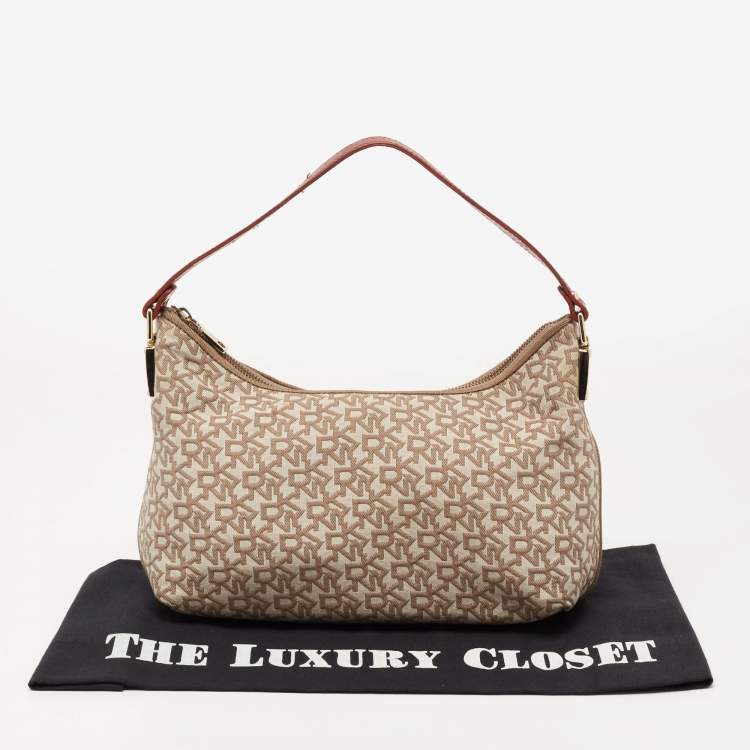 Pre Owned Dkny Beige/Rust Signature Canvas and Leather Baguette Bag