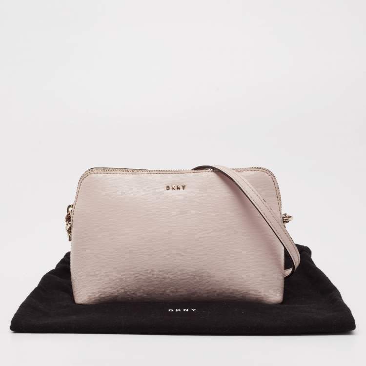 Pre Owned DKNY Light Pink Leather Dome Crossbody Bag