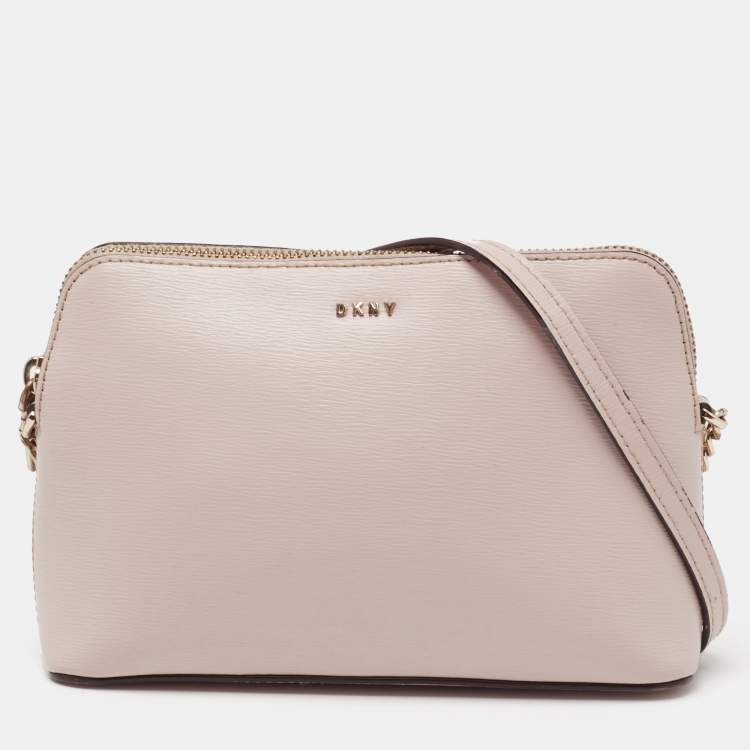 Pre Owned DKNY Light Pink Leather Dome Crossbody Bag