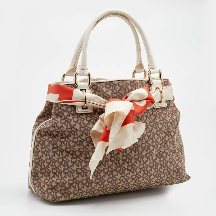 Pre Owned DKNY Beige/Brown Signature Canvas And Leather Tote