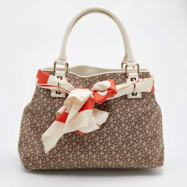 Pre Owned DKNY Beige/Brown Signature Canvas And Leather Tote