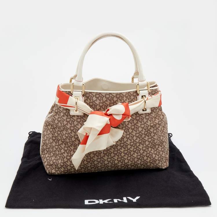 Pre Owned DKNY Beige/Brown Signature Canvas And Leather Tote