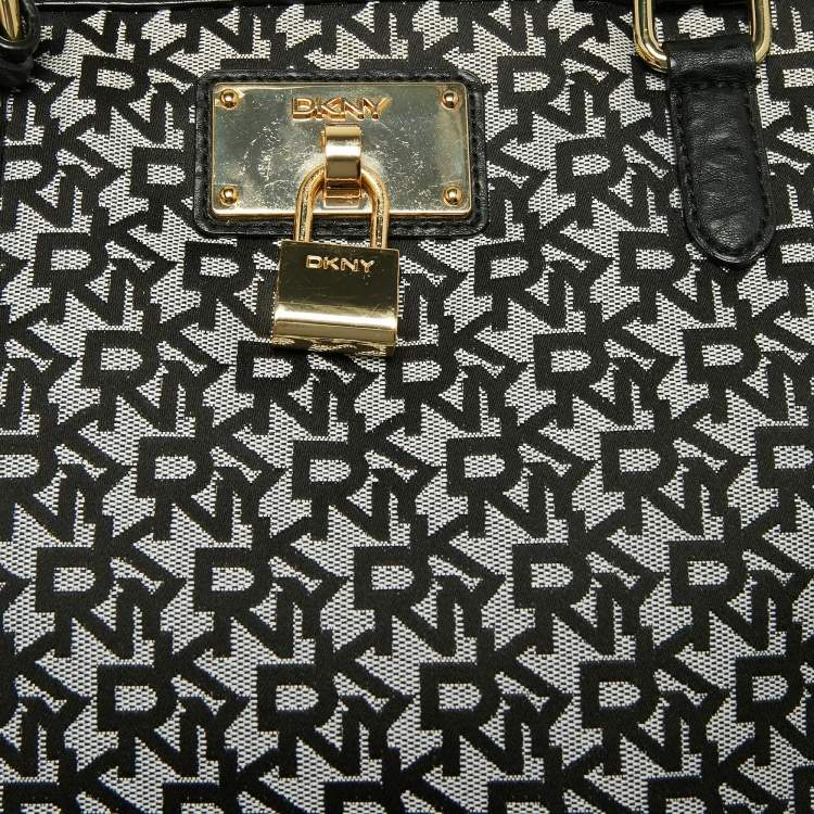 Pre Owned DKNY Black/White Signature Canvas and Leather Shopper Tote