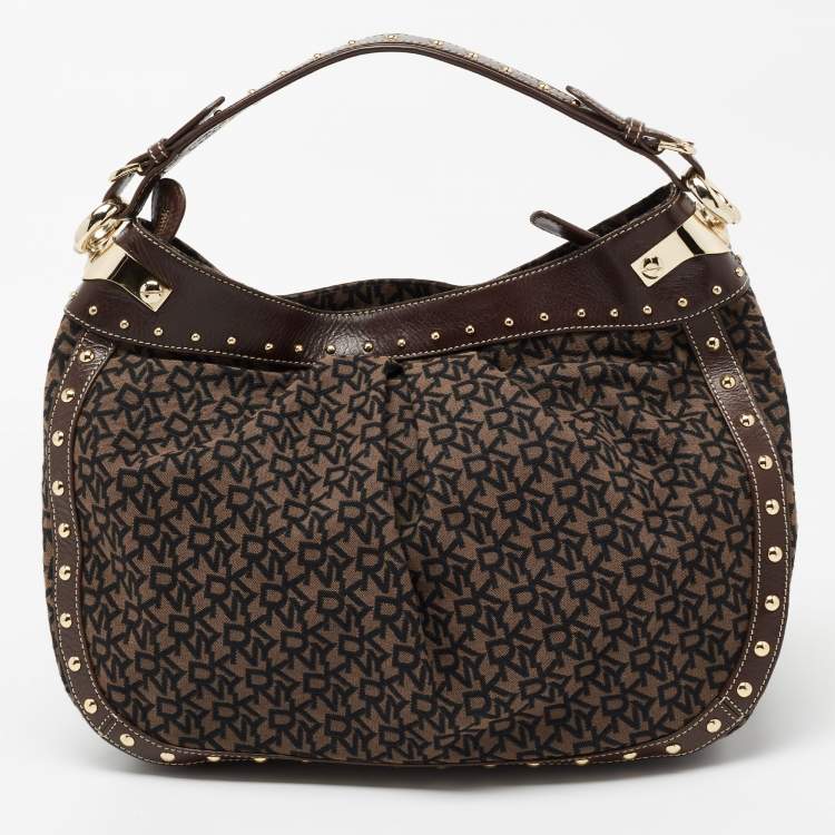 Pre Owned DKNY Brown/Black Signature Canvas And Leather Studded Hobo