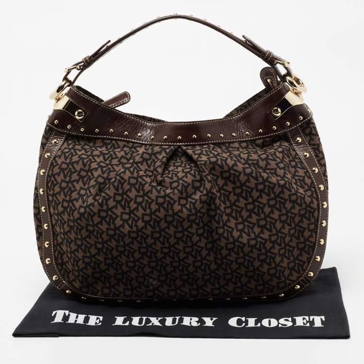 Pre Owned DKNY Brown/Black Signature Canvas And Leather Studded Hobo