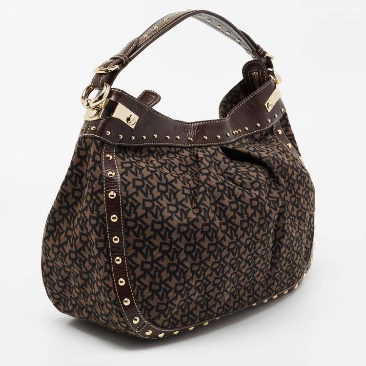 Pre Owned DKNY Brown/Black Signature Canvas And Leather Studded Hobo