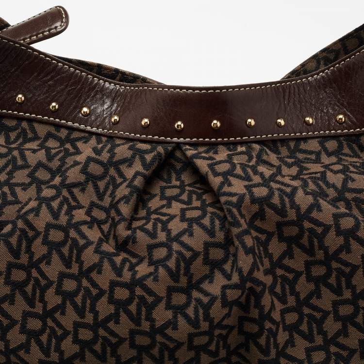 Pre Owned DKNY Brown/Black Signature Canvas And Leather Studded Hobo