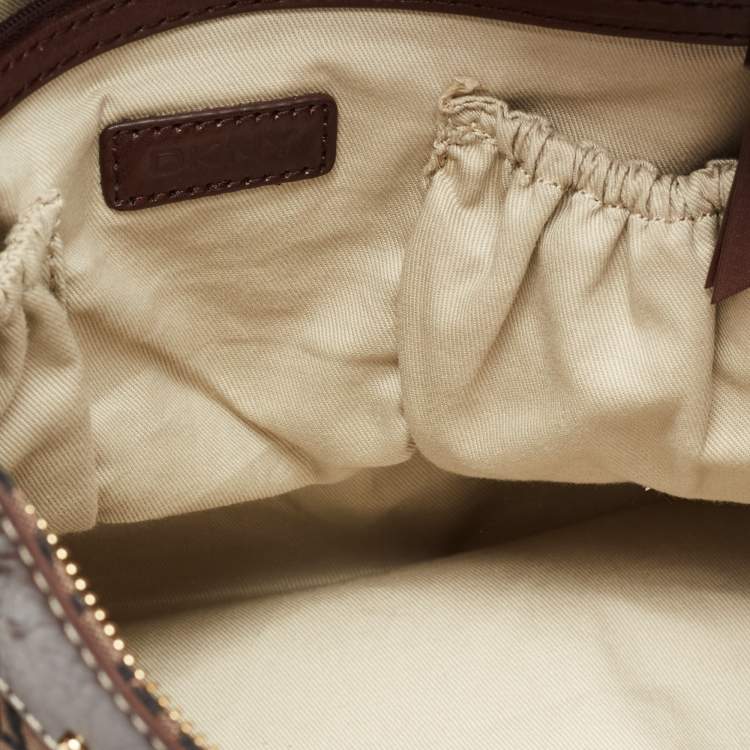 Pre Owned DKNY Brown/Black Signature Canvas And Leather Studded Hobo
