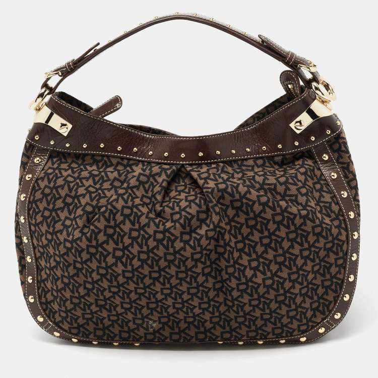Pre Owned DKNY Brown/Black Signature Canvas And Leather Studded Hobo