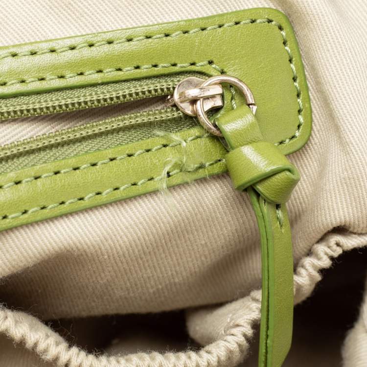 Pre Owned DKNY Brown/Green Signature Canvas And Leather Satchel