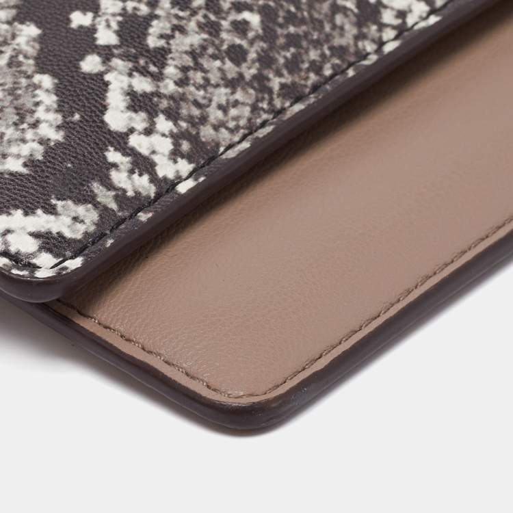 Pre Owned Dkny Beige/Black Leather Triple Wristlet Pouch