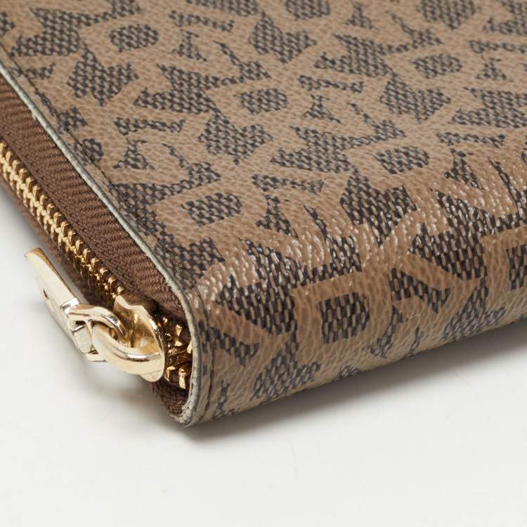Pre Owned DKNY Brown Signature Coated Canvas Zip Around Continental Wallet
