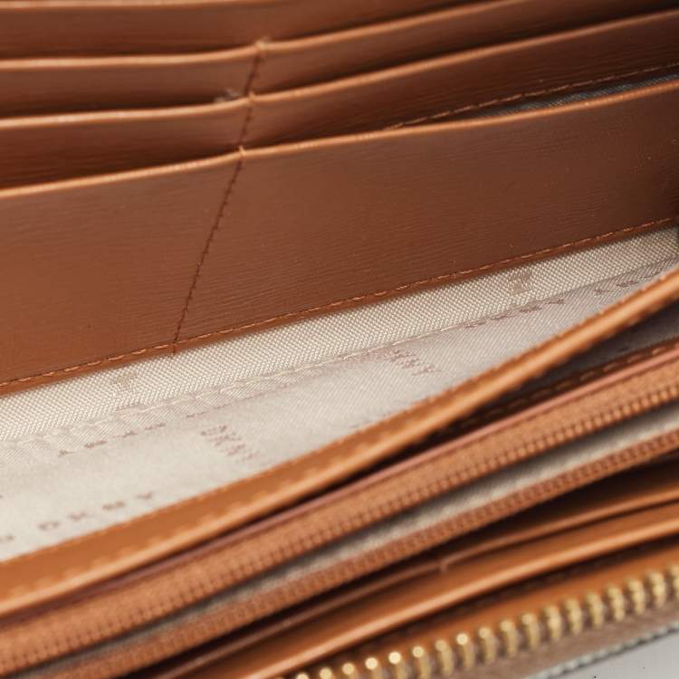 Pre Owned DKNY Brown Signature Coated Canvas Zip Around Continental Wallet