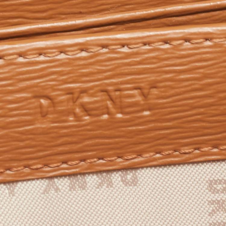 Pre Owned DKNY Brown Signature Coated Canvas Zip Around Continental Wallet
