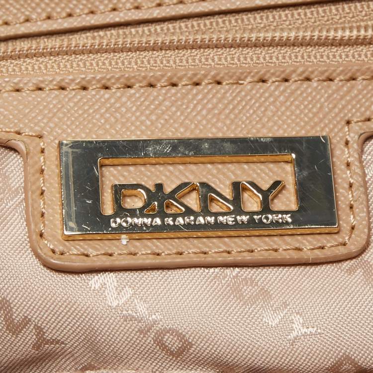 Pre Owned DKNY Red/Beige Signature Canvas and Leather Large Zip Tote
