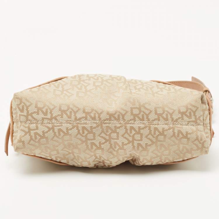 Pre Owned Dkny Beige/Light Green Monogram Canvas and Leather Buckle Baguette Bag 