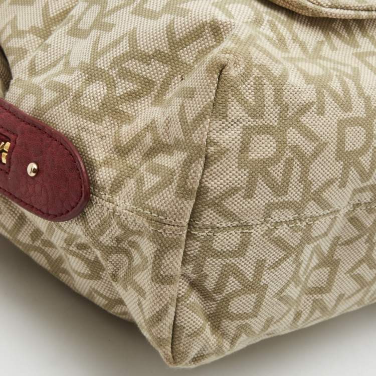 Pre Owned DKNY Red/Beige Monogram Canvas and Leather Turnlock Pocket Satchel