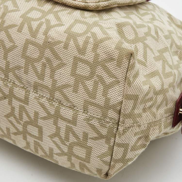 Pre Owned DKNY Red/Beige Monogram Canvas and Leather Turnlock Pocket Satchel