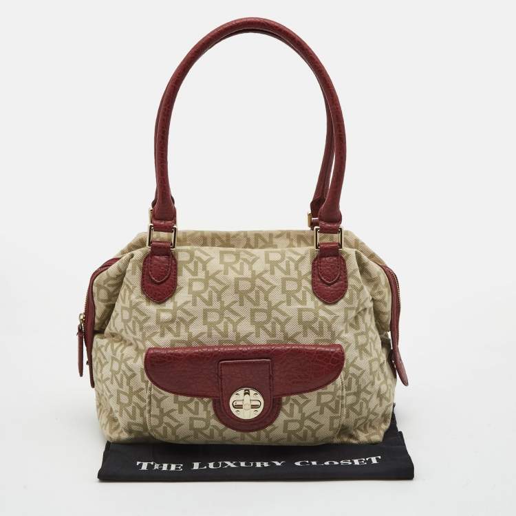 Pre Owned DKNY Red/Beige Monogram Canvas and Leather Turnlock Pocket Satchel