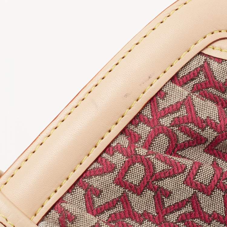 Pre Owned Dkny Pink/Beige Signature Canvas And Leather Pushlock Baguette