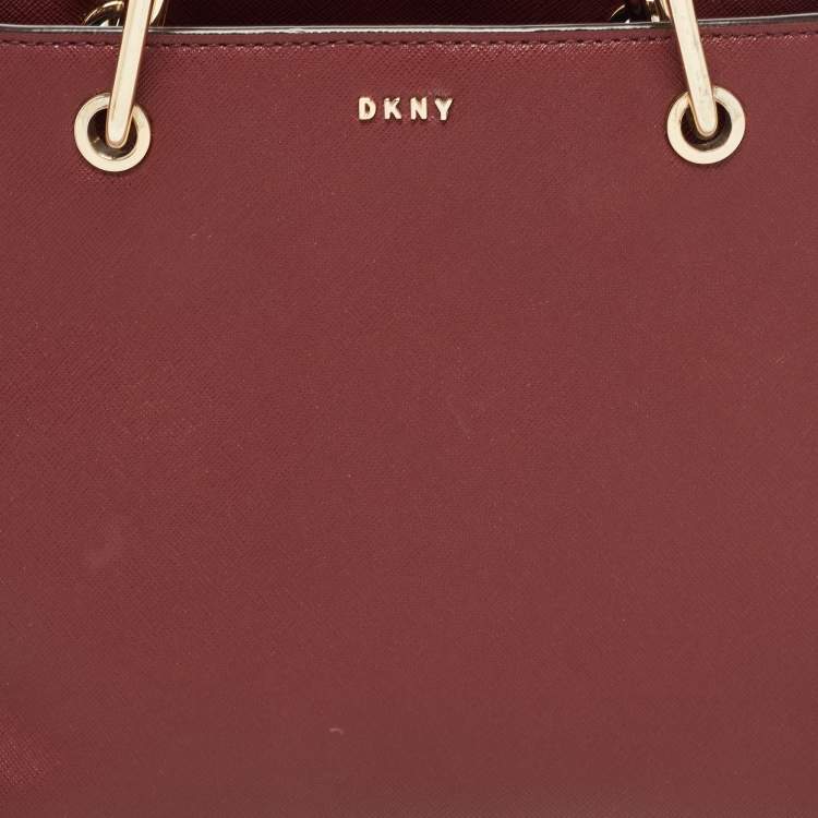 Pre Owned Dkny Burgundy Saffiano Leather Middle Zip Tote