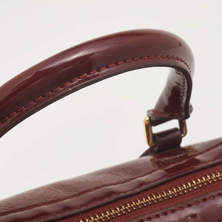 Pre Owned Dkny Dark Red Monogram Embossed Patent Leather Boston Bag