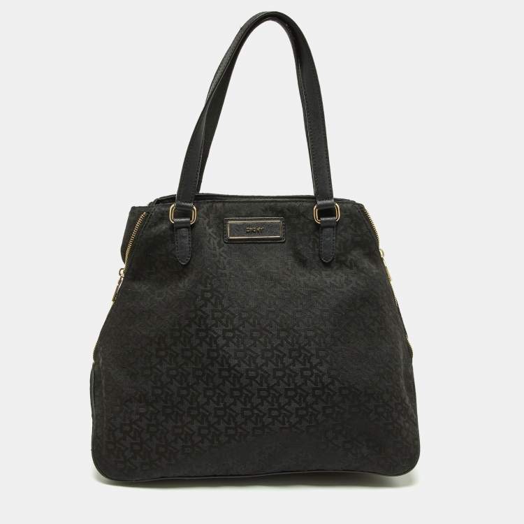 Pre Owned DKNY Black Signature Canvas and Leather Zip Side Shopper Tote