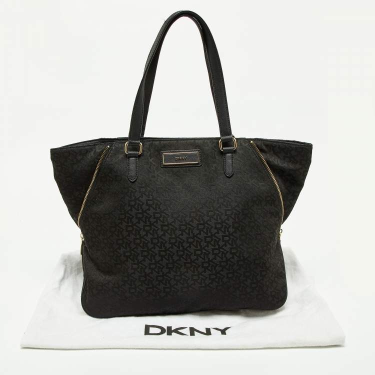 Pre Owned DKNY Black Signature Canvas and Leather Zip Side Shopper Tote