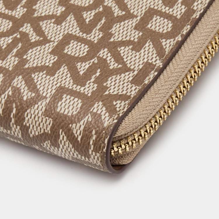 Pre Owned DKNY Beige/Brown Signature Coated Canvas Zip Around Continental Wallet