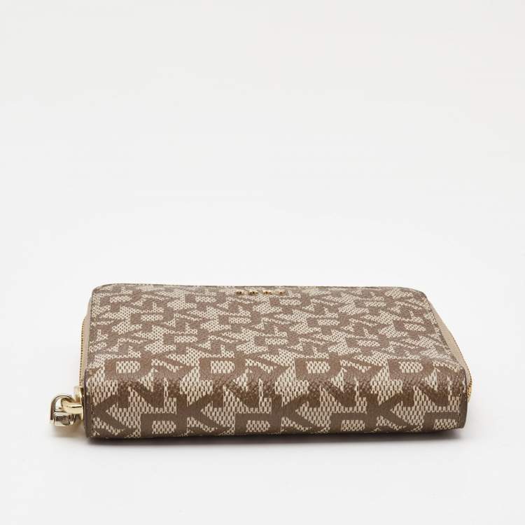 Pre Owned DKNY Beige/Brown Signature Coated Canvas Zip Around Continental Wallet