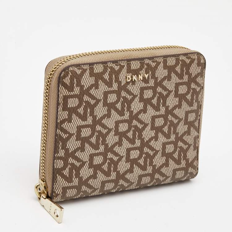 Pre Owned DKNY Beige/Brown Signature Coated Canvas Zip Around Continental Wallet