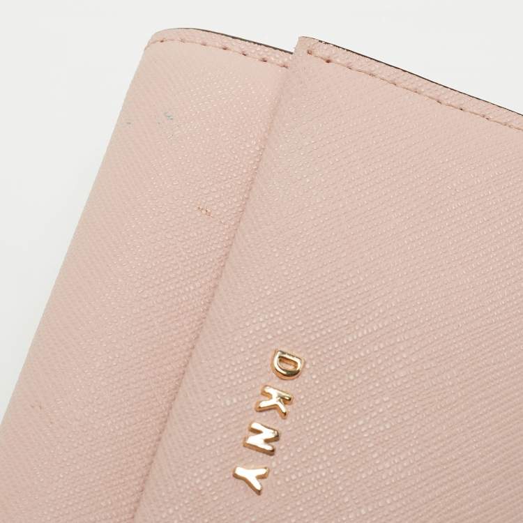 Pre Owned DKNY Pink Saffiano Leather Flap Compact Wallet
