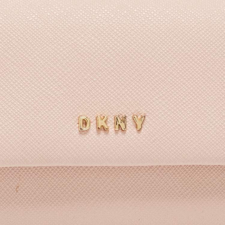 Pre Owned DKNY Pink Saffiano Leather Flap Compact Wallet