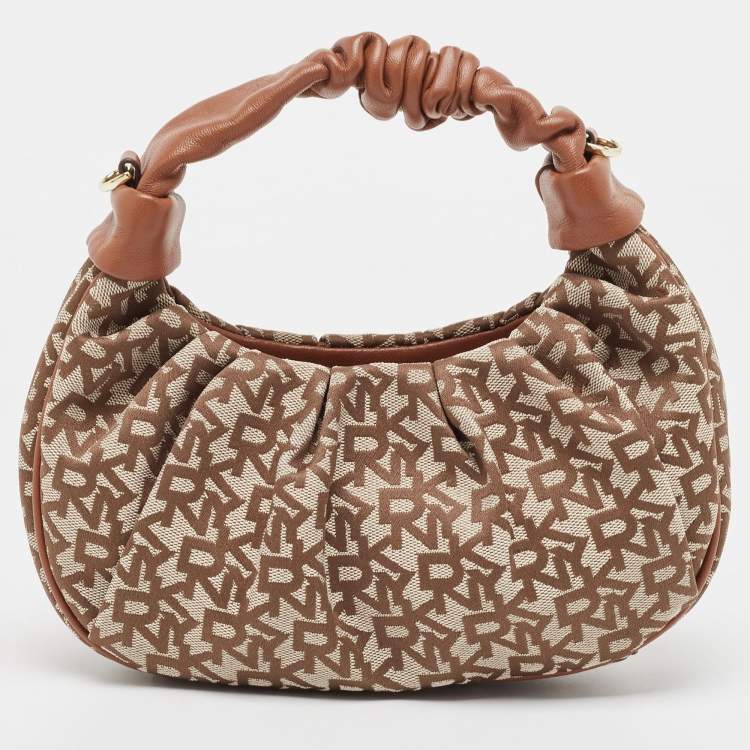 Pre Owned DKNY Brown/Beige Signature Canvas and Leather Reese Demi Crossbody Bag