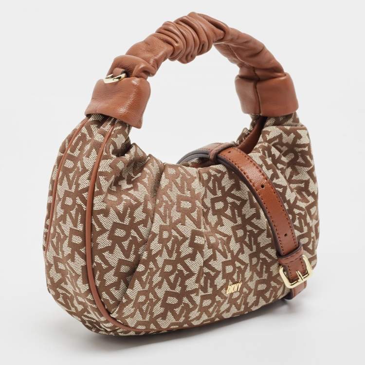 Pre Owned DKNY Brown/Beige Signature Canvas and Leather Reese Demi Crossbody Bag