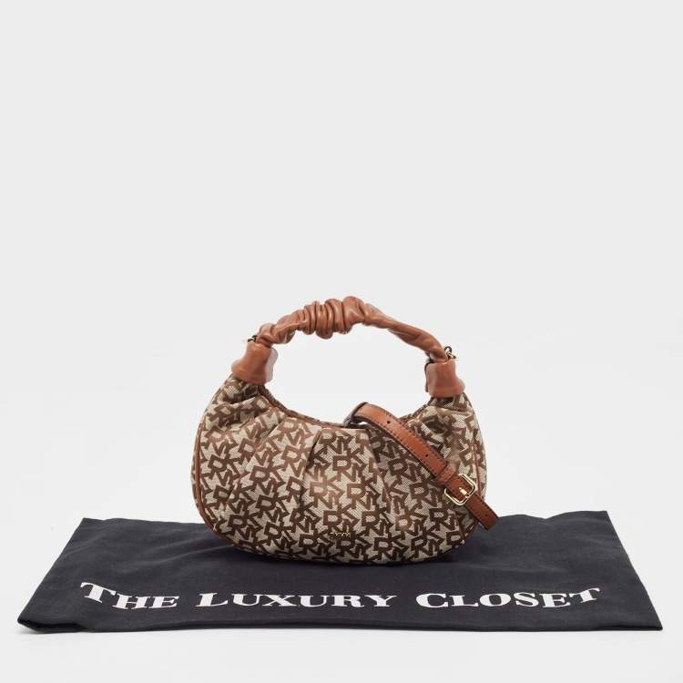 Pre Owned DKNY Brown/Beige Signature Canvas and Leather Reese Demi Crossbody Bag