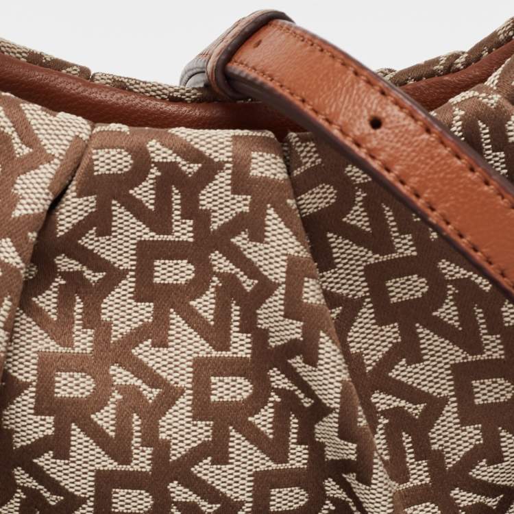 Pre Owned DKNY Brown/Beige Signature Canvas and Leather Reese Demi Crossbody Bag