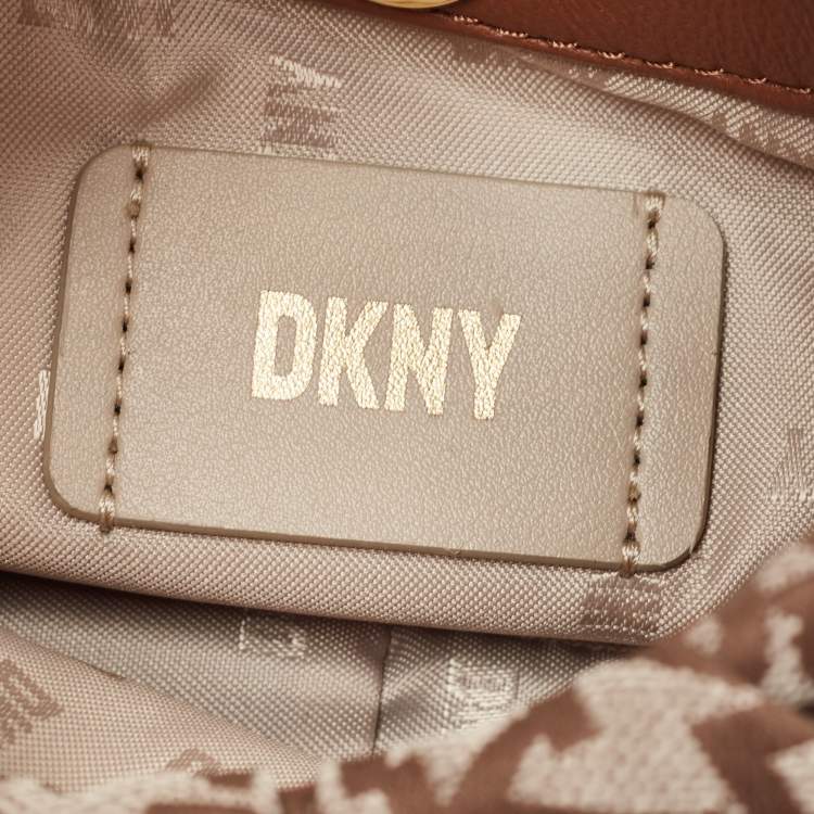 Pre Owned DKNY Brown/Beige Signature Canvas and Leather Reese Demi Crossbody Bag