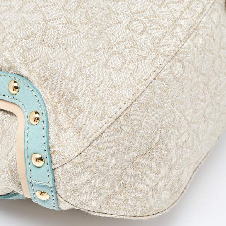 Pre Owned DKNY Cream/Blue Monogram Canvas and Leather Buckle Hobo