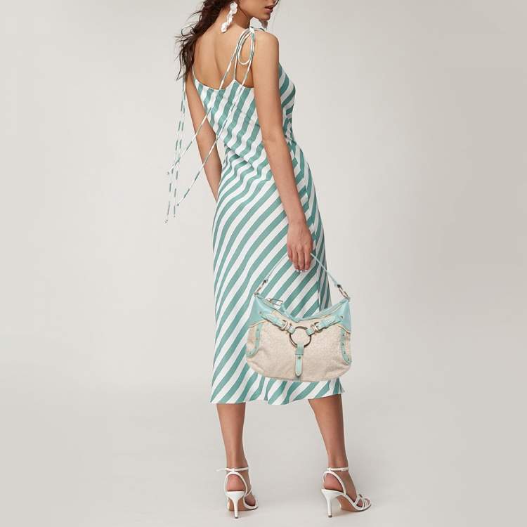 Pre Owned DKNY Cream/Blue Monogram Canvas and Leather Buckle Hobo