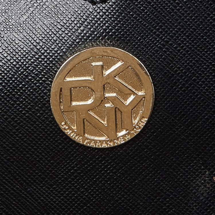 Pre Owned DKNY Beige/Black Signature Canvas and Leather Studded Satchel
