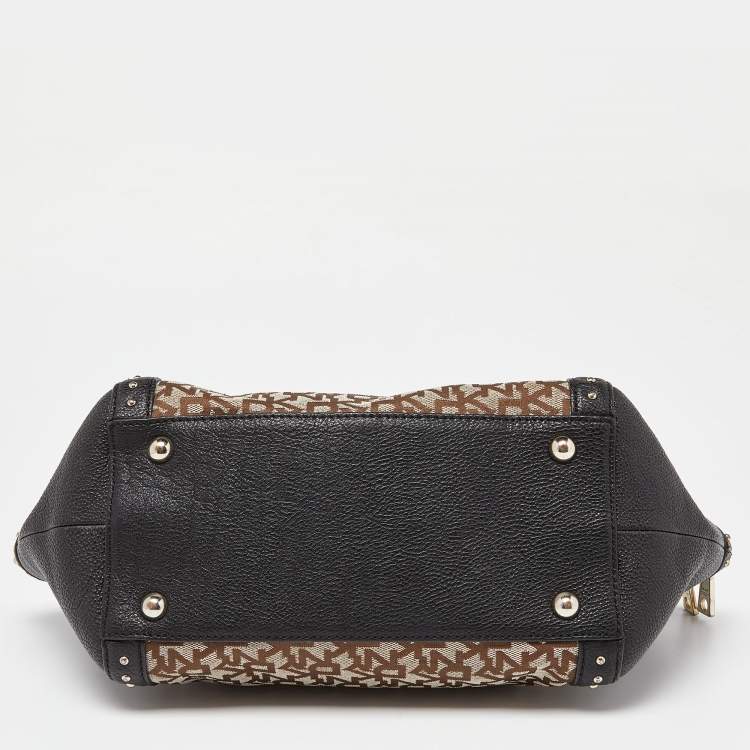 Pre Owned DKNY Beige/Black Signature Canvas and Leather Studded Satchel